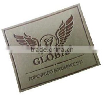 Embossed customized leather label