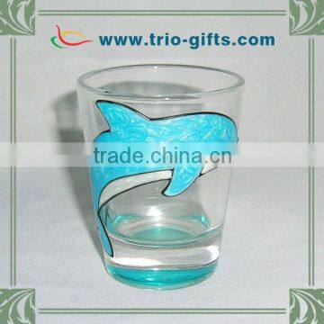 clear shot glass with dolphin logo