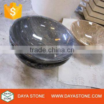 black marble stone basin