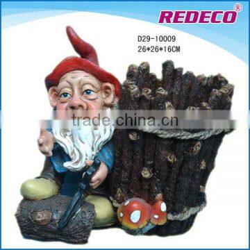 Resin garden gnome with plant pot