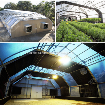 Easily installed low cost light deprivation greenhouse fully automated