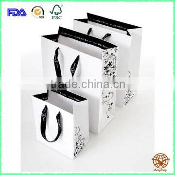 2016 New Glossy Lamination Shopping Paper Bag with Rope Handle