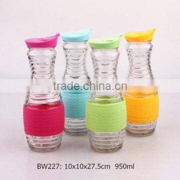 Clear Round Glass Juice Jar With Plastic Lid and Silicon Wrap