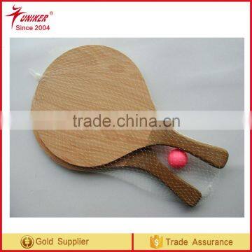 wooden paddles with rubber ball