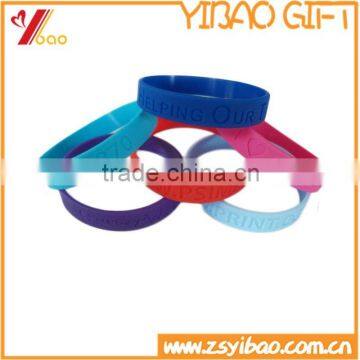 Cheap price custom debossed logo wristbands/own design silicone bracelet