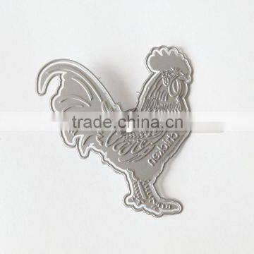 Die cut metal etching stencil for scrapbook fabrication