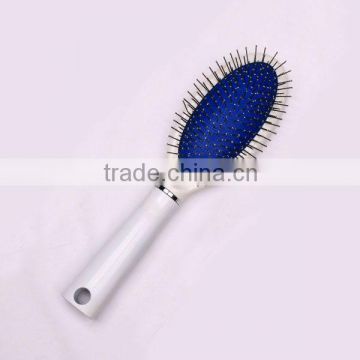 Plastic cushion hair brush with steel pins