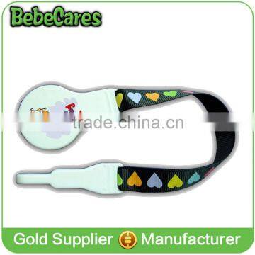 Plastic Hot selling funny ribbon baby pacifier clip baby metal pacifier clip holder