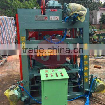 Cement Brick Block Making Machine in Stock photo-5