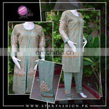 New Indian/ Pakistani Fancy Embroidered Net outfit embellished with front open coat style and fancy motive trouser pants.