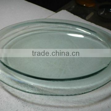 Oval shaped clear glass plate