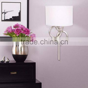 1017-1 Sleek Brushed Steel Finish Raindrops Falling on a Calm Body of Water Intertwining Circles Plug-In Wall Sconce photo-2