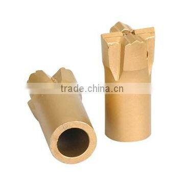 Cross-shaped square hole DTH core drill bit