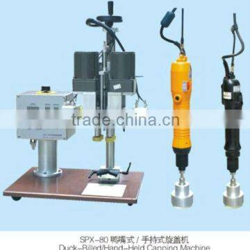 duck-billed or hand-held capping machine