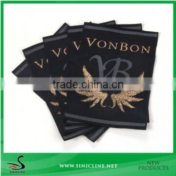 Sinicline custom clothing label with woven gold logo                        
                                                Quality Choice