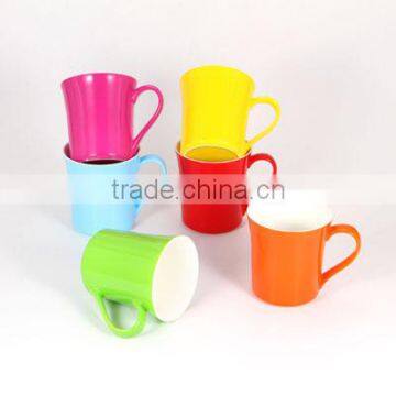 Ceramic mugs and cups with bright colors