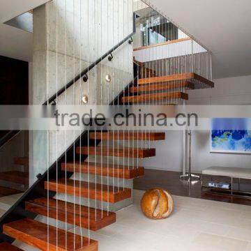 floating teak staircase with wire rails