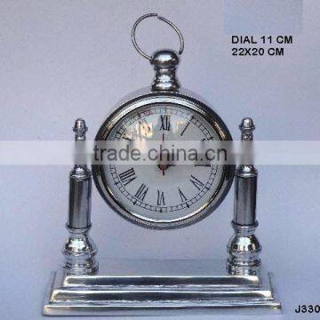 Two pillar Round dial table clock in mirror polish Finish and also available in nickel plating