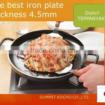 The iron teppanyaki plate is japanese restaurant equipment