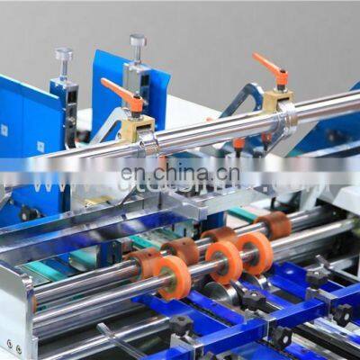 UTM850B Post-press Automatic E-flute Kraft Paper Box Window Patching Gluing Machine Equipment for Medicine Wine Milk Package photo-2