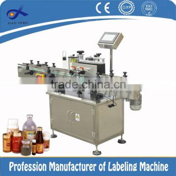 Plastic pails labeling machine