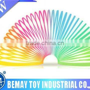 Promotional educational toys pull ring magic rainbow spring wholesale