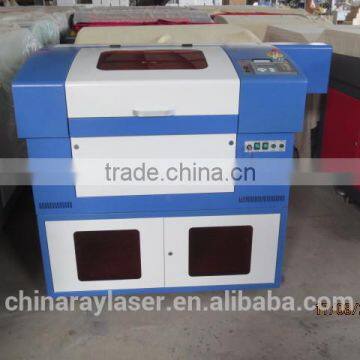 China CO2 SmallAcrylic Granite Stone Paper Fabric Laser Cutting Machine Price Cheap photo-5