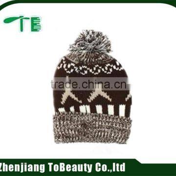 embroidered knitted hat with top ball