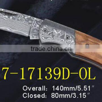 Different size damascus folding knives