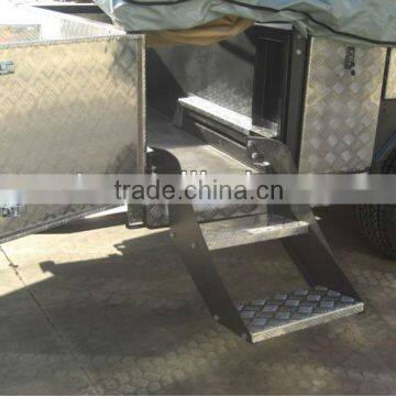 Large soft floor camper trailer with step through