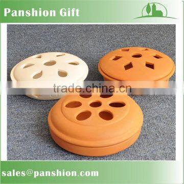 Terracotta mosquito coil holder