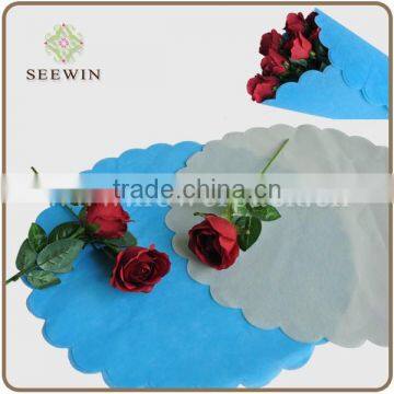 Nonwoven wrapping paper