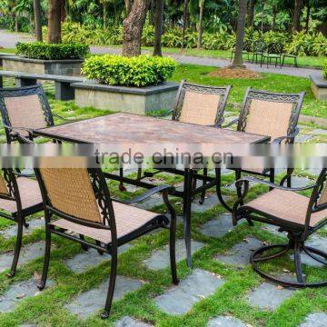 garden dining chair with ceramic table / patio dining swivel set in cast aluminum mental material with sling fabric