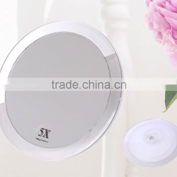 Plastic cosmetic mirror with suction cup