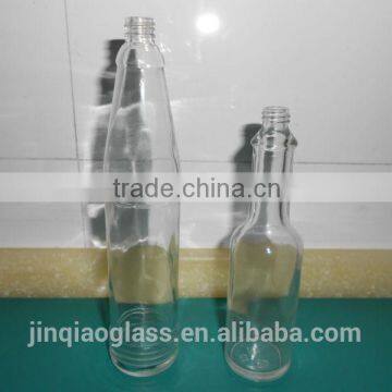 clear glass pepper sauce bottle