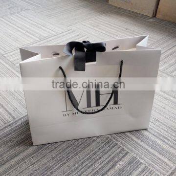 2016 china fancy custom made cheap christmas gift paper bags with company logo