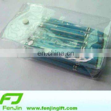 Small clear plastic flap bag with button top