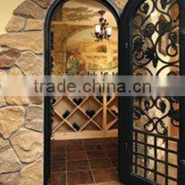 wrought iron cellar door with glass