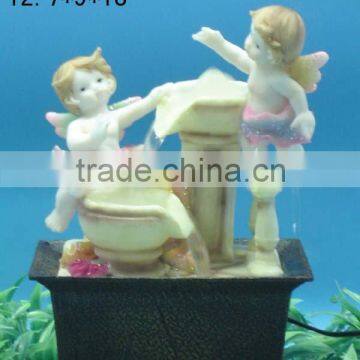 Polyresin cherub w/battery operated fountain