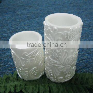 white embossed pillar candles