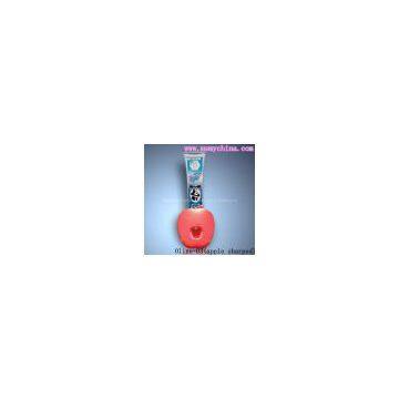 Olise-apple shaped automatic toothpaste squeezing device