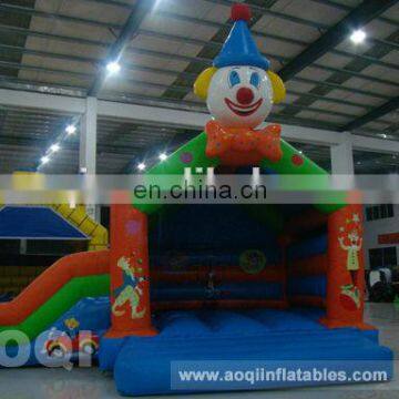 AOQI crazy fun cheapest clown inflatable bouncing house with mini slide