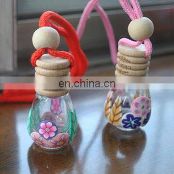 2014 hottest unique design polymer clay perfume glass bottle with cork