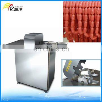 Machine for tying sausage