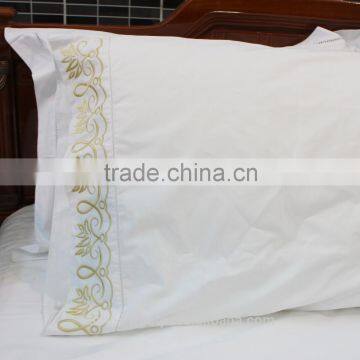 Abstract lotus embroidered pillowcase with hemstitch in gold