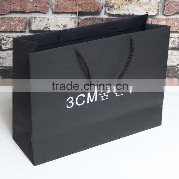 Black paper material printing brand name clothing paper bag