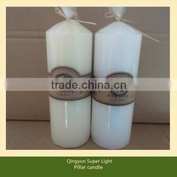 white pillar church candles