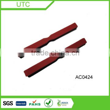 PVC injection on adhesive hook and loop tape for zipper puller