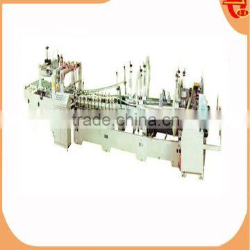 Automatic corrugated carton box folding gluing machine