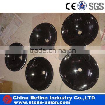 Black Marquina marble round basin